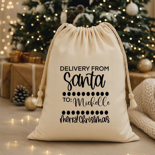 Delivery From Santa, Santa Sack with custom name under a christmas tree.