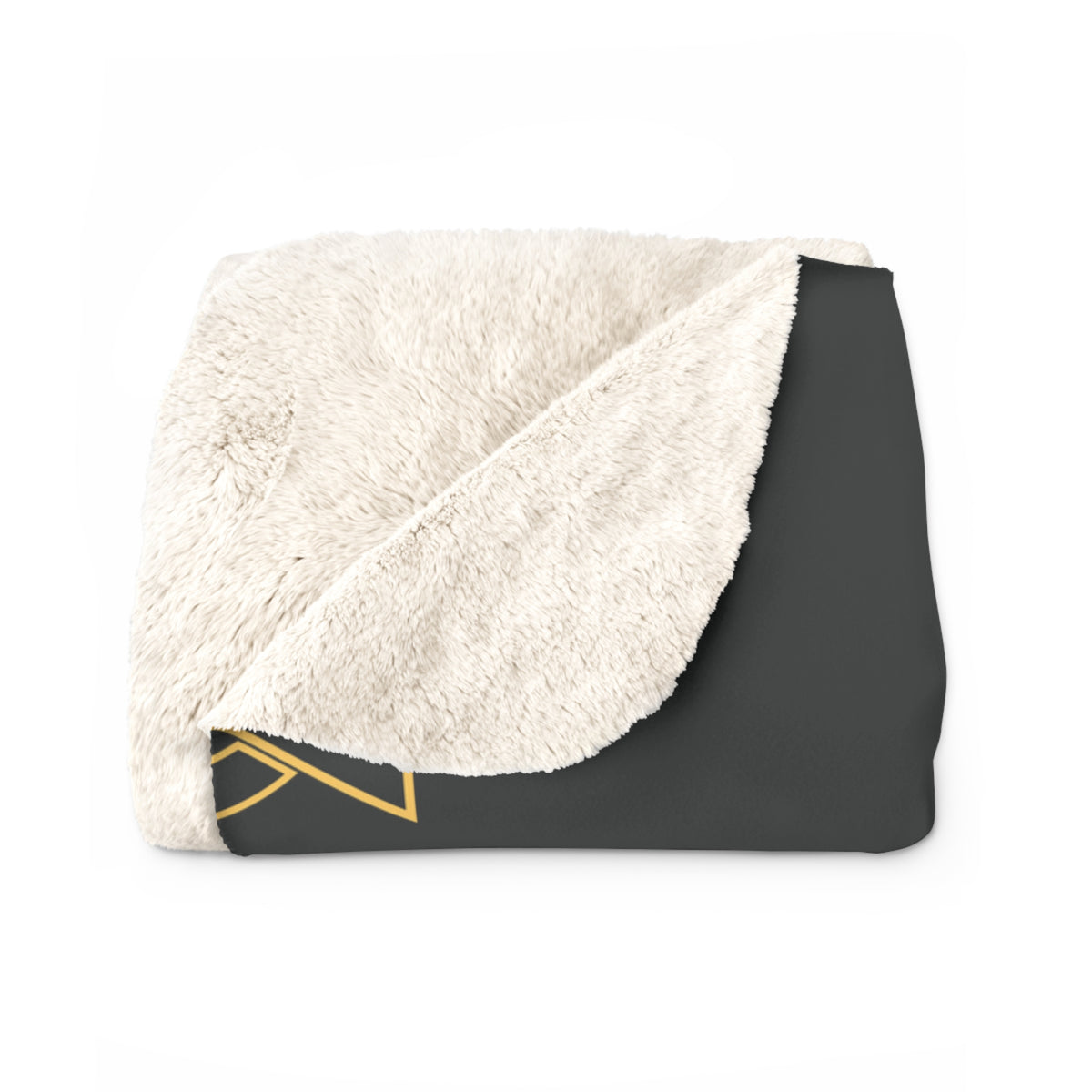 Folded blanket with white sherpa interior and dark green exterior with gold patterns on a white background