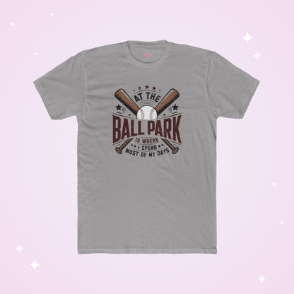 Gray t-shirt with baseball graphic and text on a light purple background