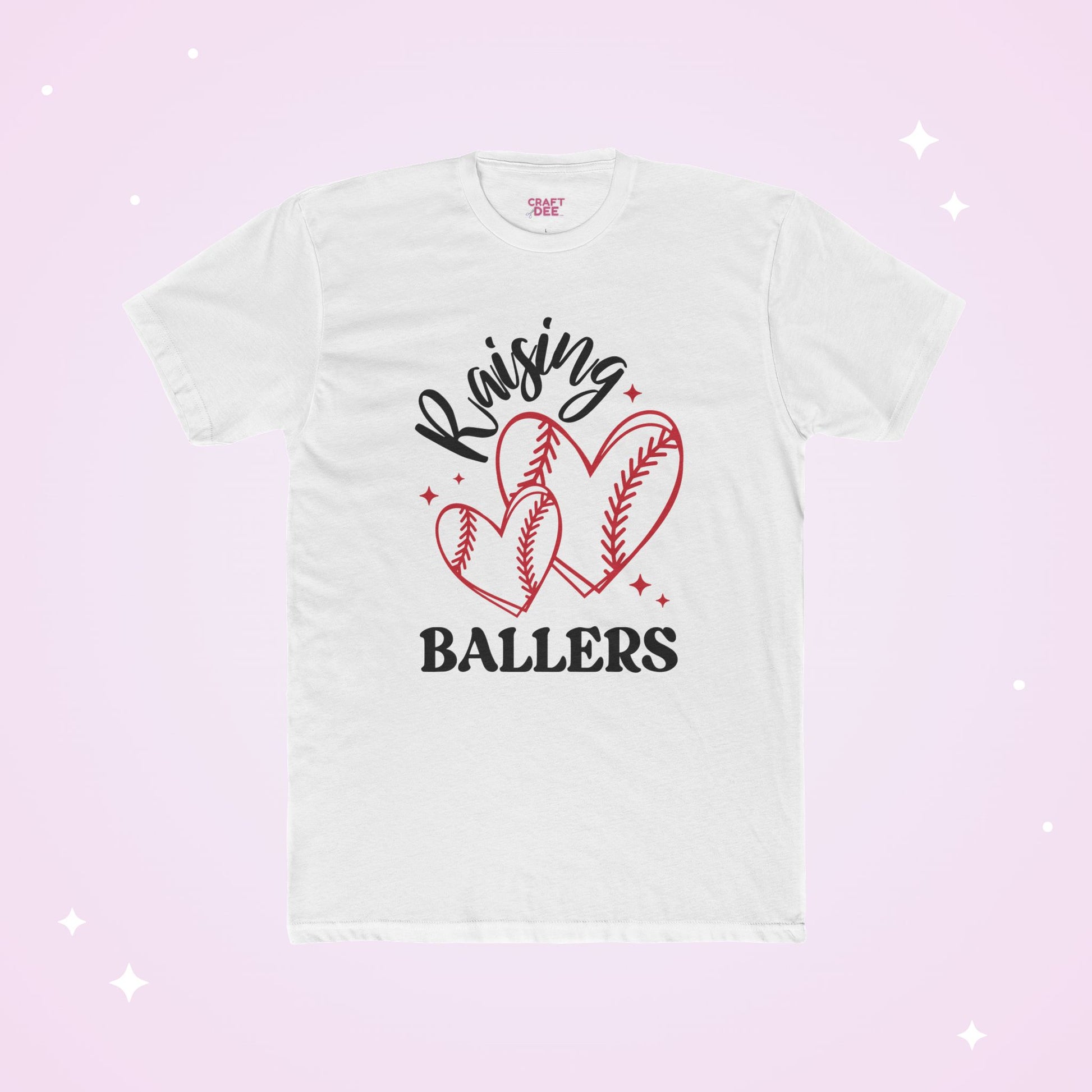 White t-shirt with 'Raising Ballers' text and heart designs on a pink gradient background