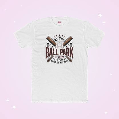 White t-shirt with baseball graphic and text on a light pink background