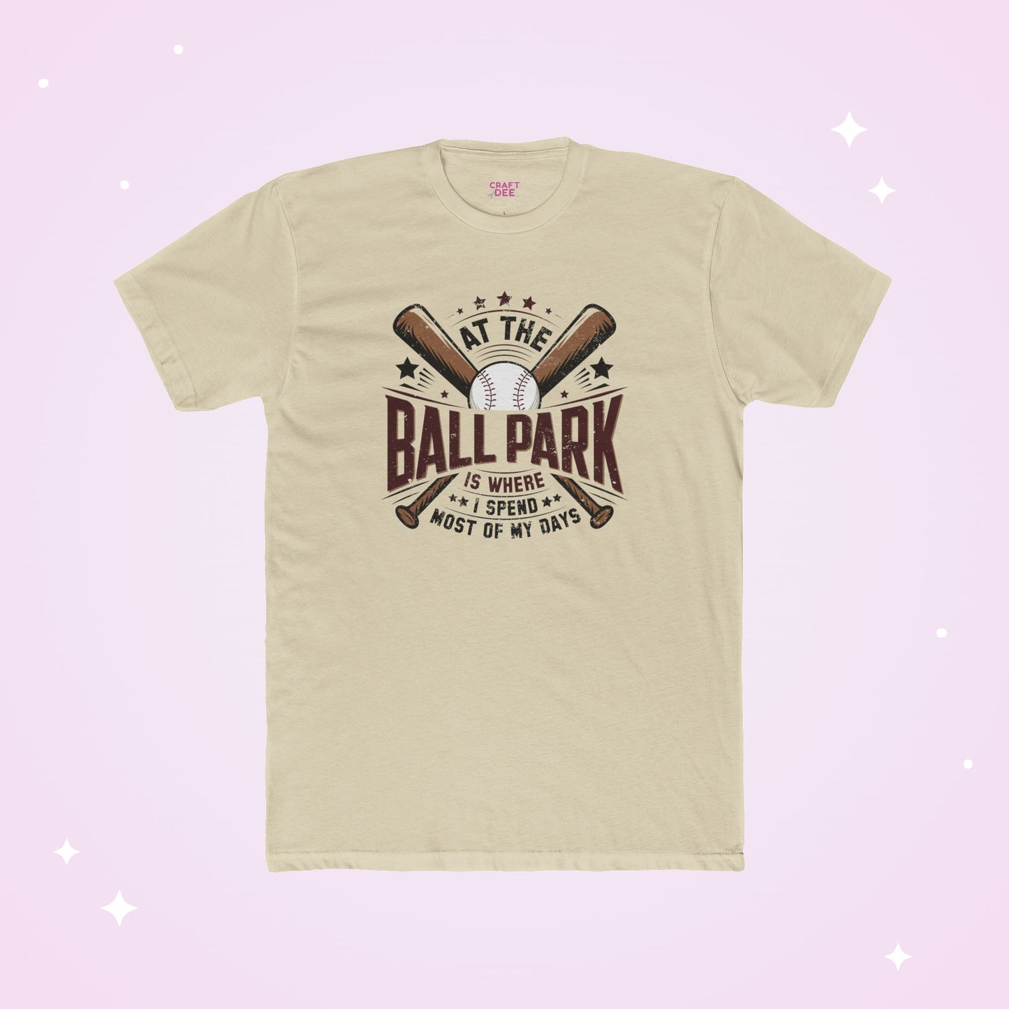 Beige t-shirt with baseball graphic and text on a light purple background