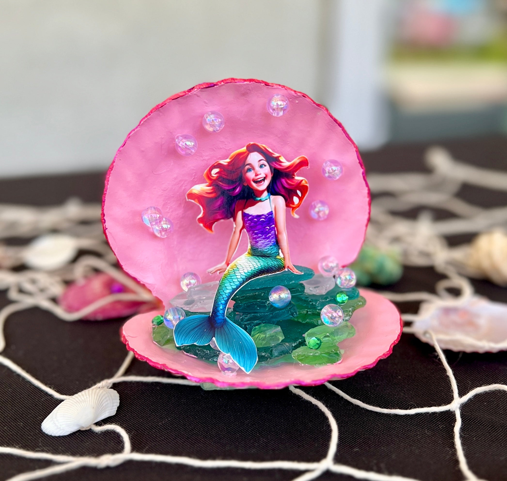 DIY custom mermaid centerpiece, mermaid sitting on sea glass stones with pink shells, custom mermaid, with iridescent bubble beads